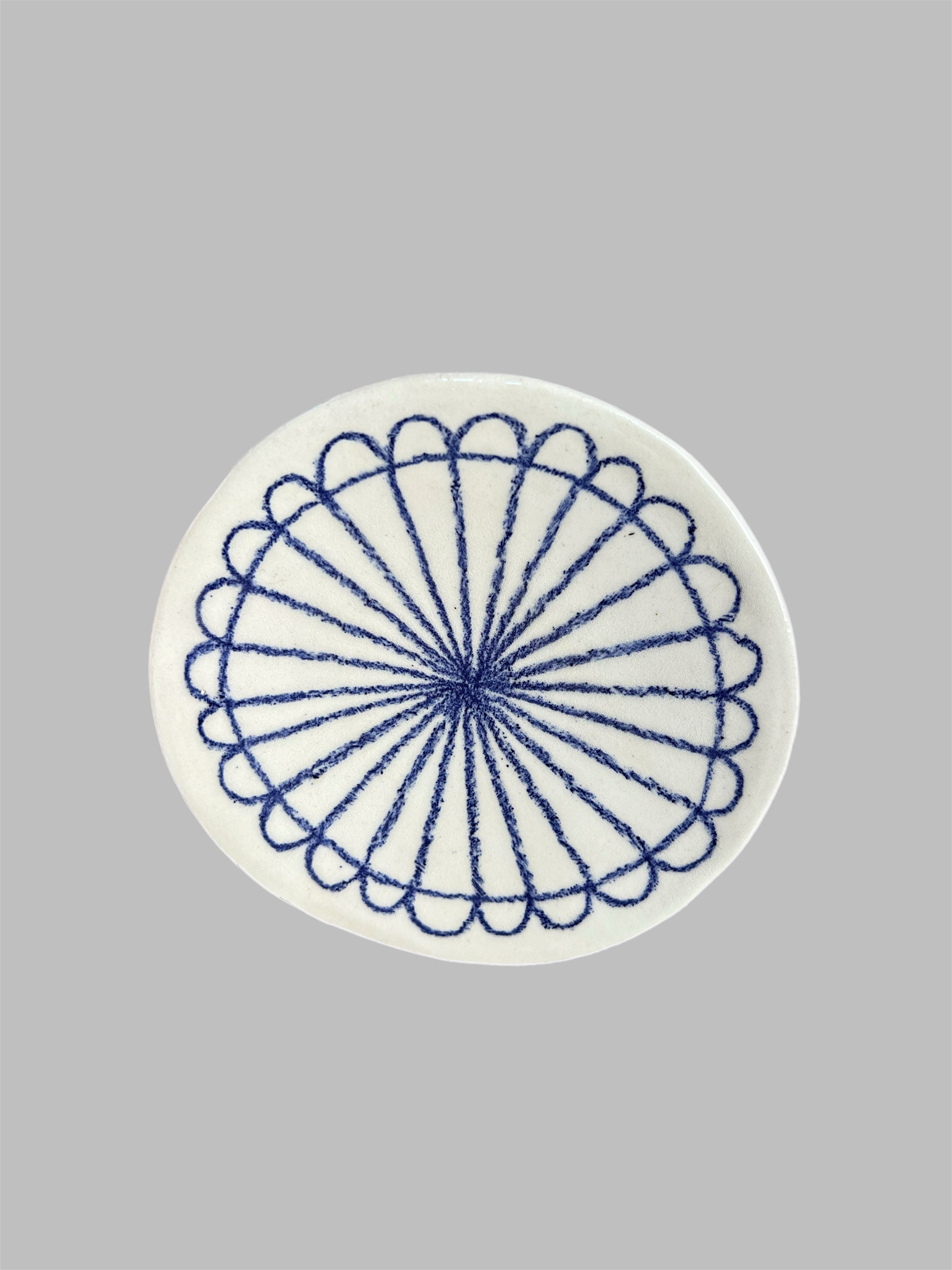 Ceramic pin wheel dish