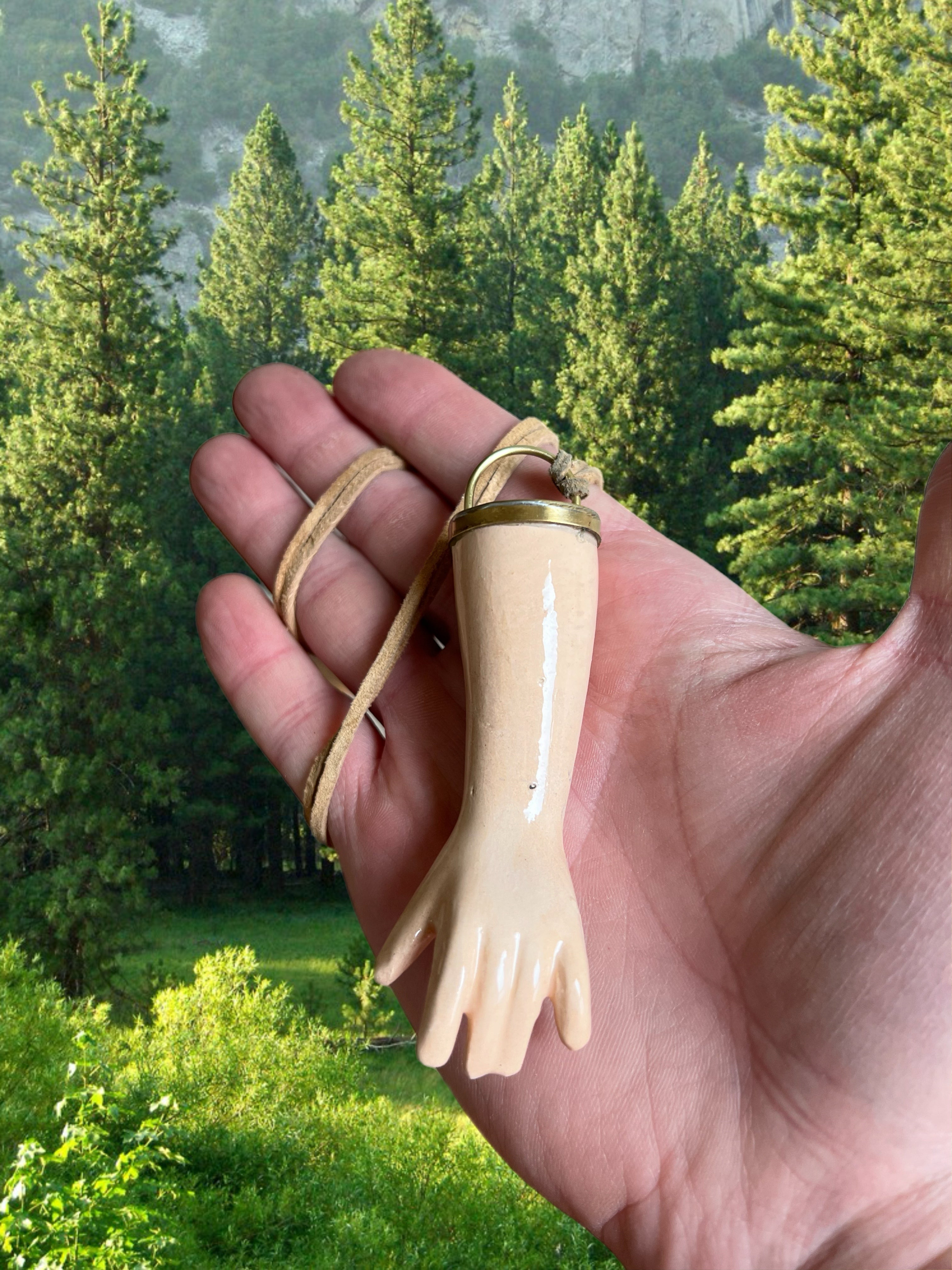 Hand eye necklace