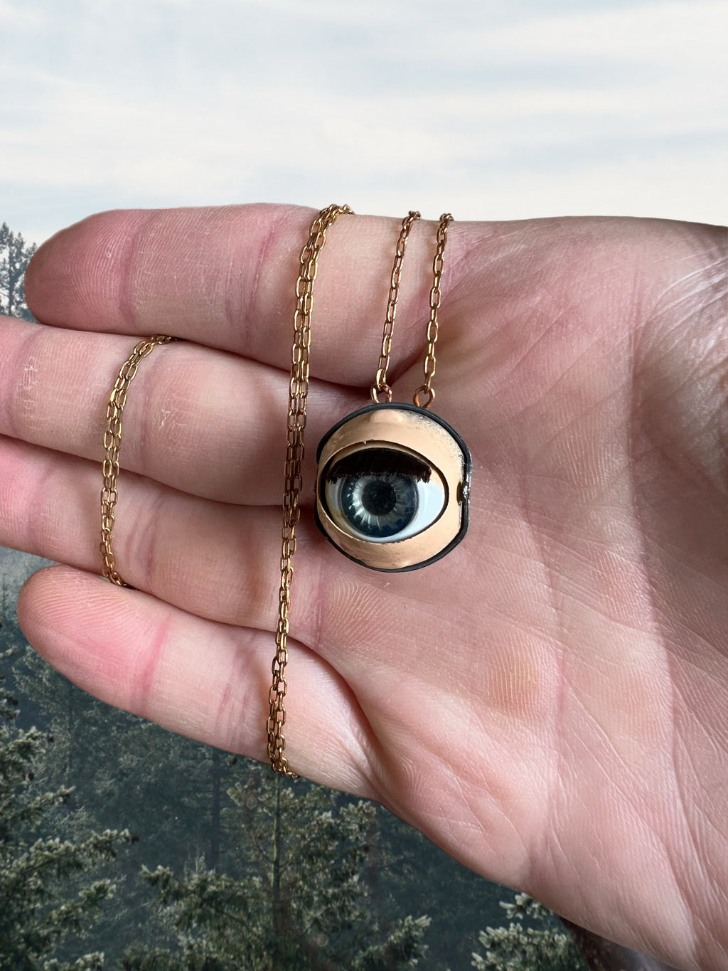 Vintage doll eye necklace