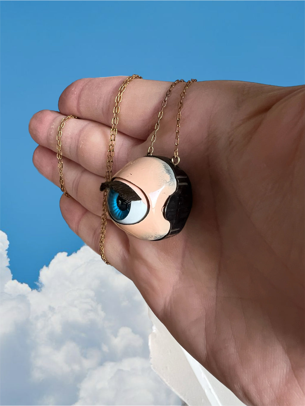 Large sleepy doll eye necklace