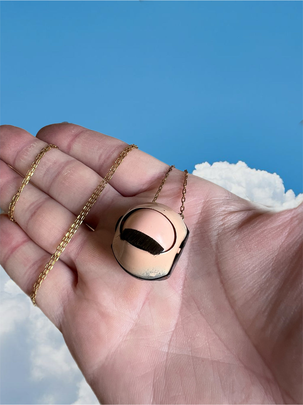 Large sleepy doll eye necklace